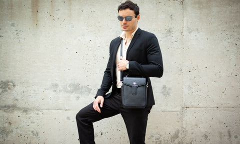 Image of a man wearing a black La Coutts Duncan Thermal Designer Crossbody bag