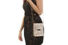 Girl with a gold metallic snake like leather High Fashion Thermal Designer Handbag by La Coutts Toronto